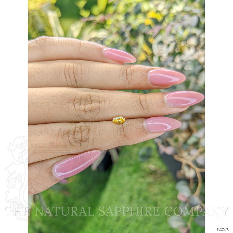 0.40 Ct. Orangish Yellow Sapphire from Ceylon (Sri Lanka)