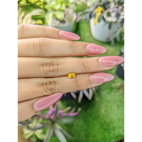 0.60 Ct. Orangish Yellow Sapphire from Ceylon (Sri Lanka) Life Style