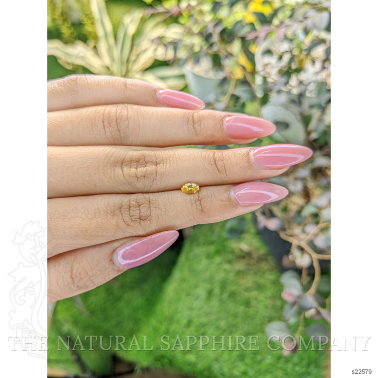 0.43 Ct. Orangish Yellow Sapphire from Ceylon (Sri Lanka)