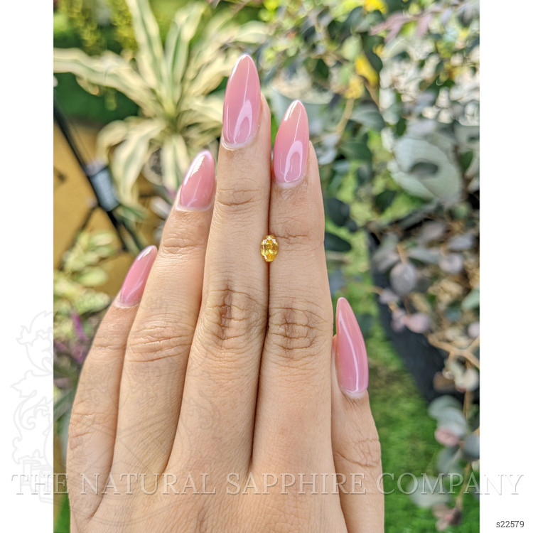 0.43 Ct. Orangish Yellow Sapphire from Ceylon (Sri Lanka)