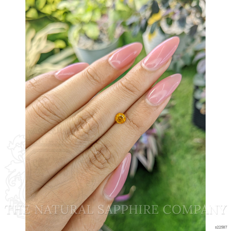 0.56 Ct. Yellowish Orange Sapphire from Ceylon (Sri Lanka)