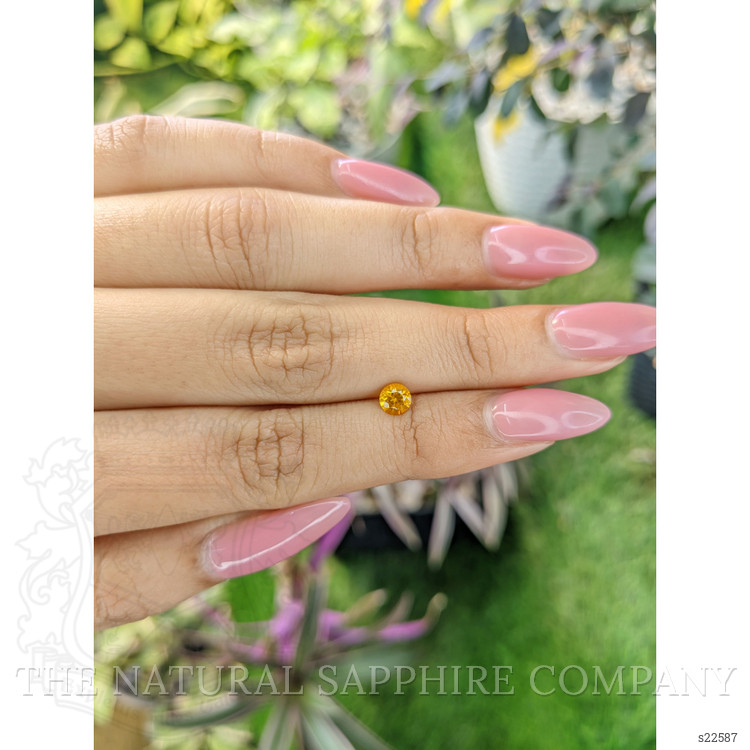 0.56 Ct. Yellowish Orange Sapphire from Ceylon (Sri Lanka)