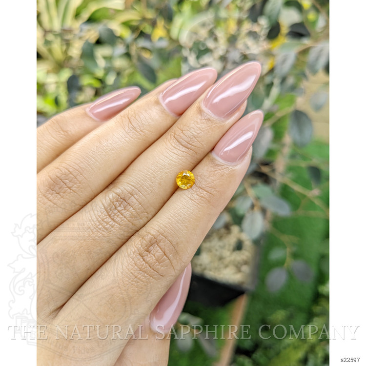 0.65 Ct. Yellowish Orange Sapphire from Ceylon (Sri Lanka)