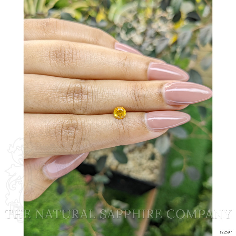 0.65 Ct. Yellowish Orange Sapphire from Ceylon (Sri Lanka)
