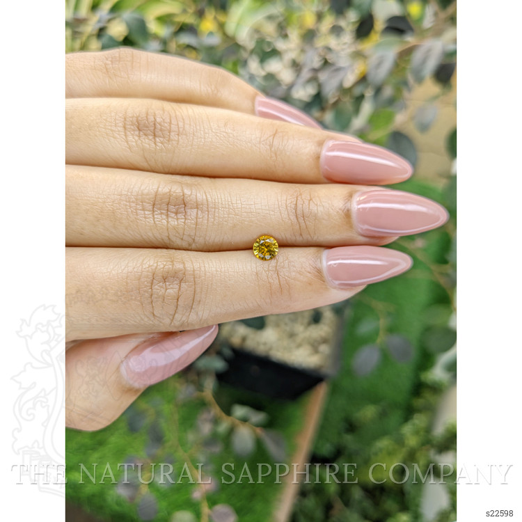 0.57 Ct. Yellowish Orange Sapphire from Ceylon (Sri Lanka)