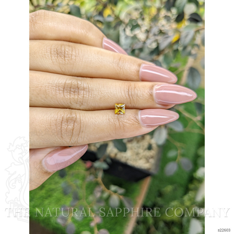 0.63 Ct. Orangish Yellow Sapphire from Ceylon (Sri Lanka)