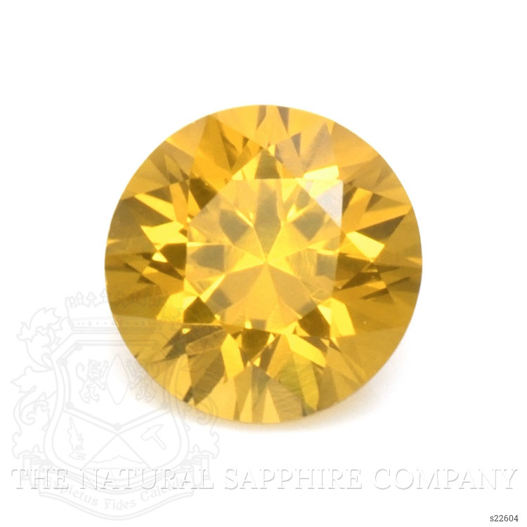 0.65 Ct. Orangish Yellow Sapphire from Ceylon (Sri Lanka)
