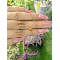 0.68 Ct. Yellowish Orange Sapphire from Ceylon (Sri Lanka) Life Style