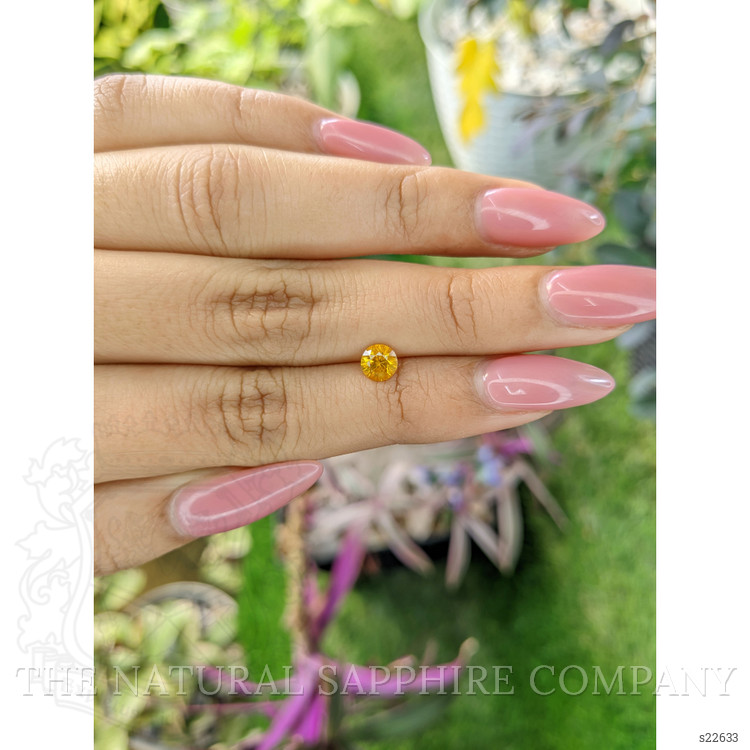 0.68 Ct. Yellowish Orange Sapphire from Ceylon (Sri Lanka)