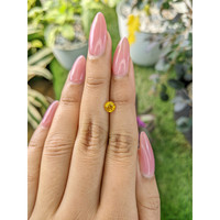0.68 Ct. Yellowish Orange Sapphire from Ceylon (Sri Lanka) Life Style