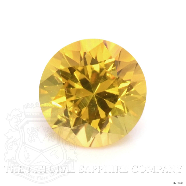 0.65 Ct. Orangish Yellow Sapphire from Ceylon (Sri Lanka)