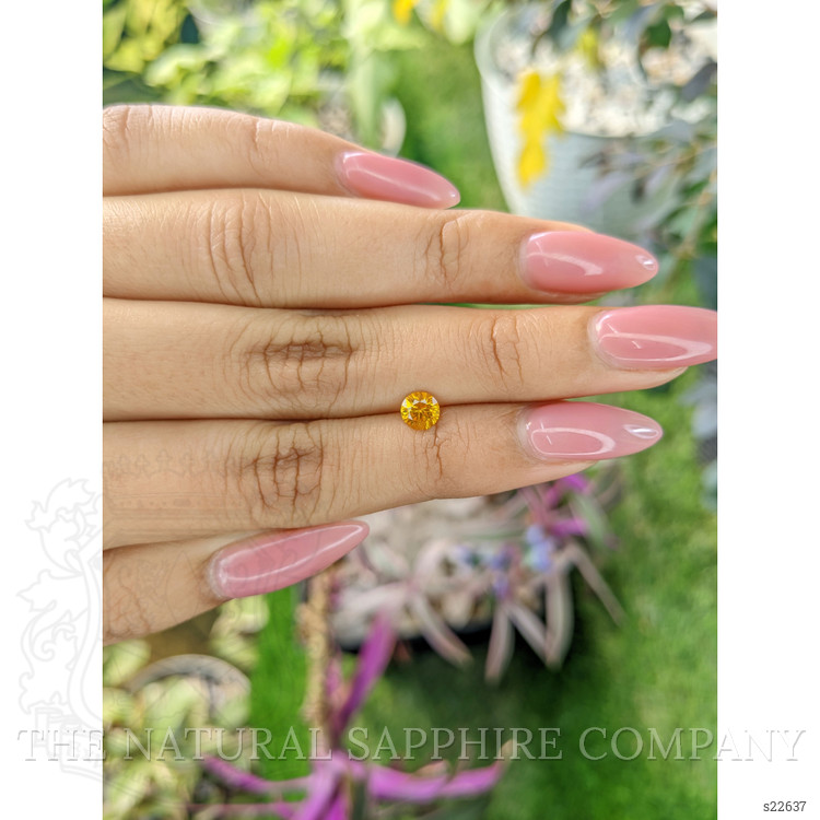 0.60 Ct. Yellowish Orange Sapphire from Ceylon (Sri Lanka)