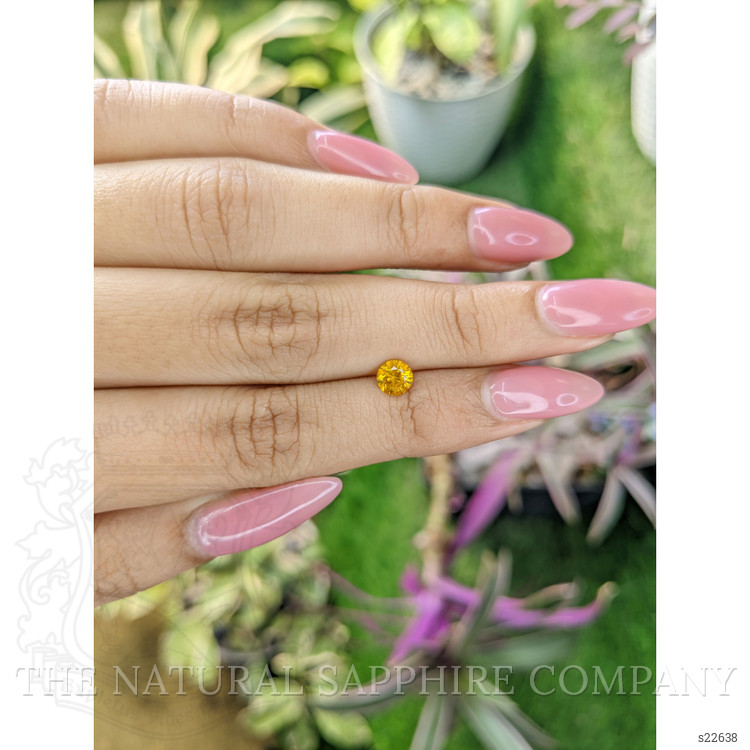 0.65 Ct. Yellowish Orange Sapphire from Ceylon (Sri Lanka)