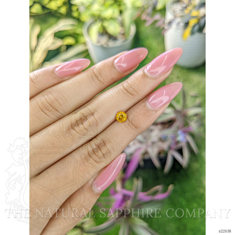 0.65 Ct. Yellowish Orange Sapphire from Ceylon (Sri Lanka)