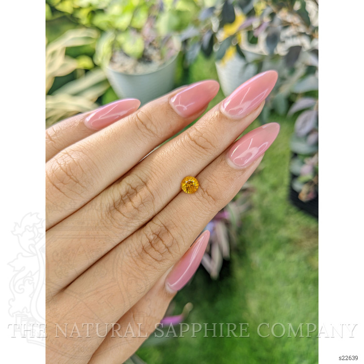 0.65 Ct. Yellowish Orange Sapphire from Ceylon (Sri Lanka)