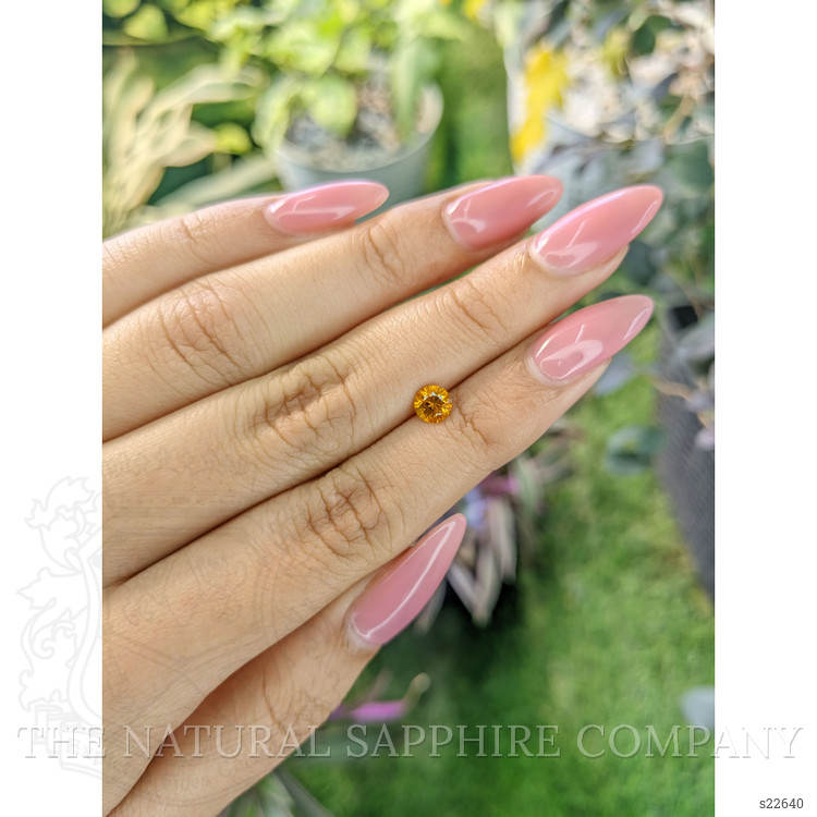 0.67 Ct. Yellowish Orange Sapphire from Ceylon (Sri Lanka)