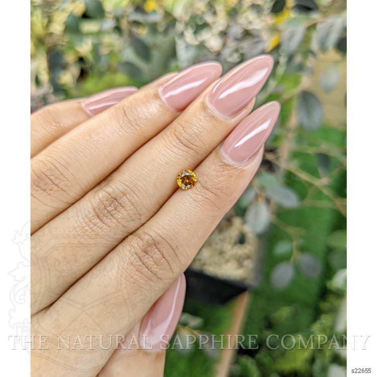 0.51 Ct. Yellowish Orange Sapphire from Ceylon (Sri Lanka)