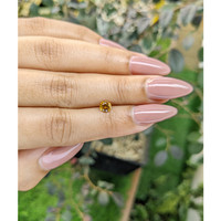 0.51 Ct. Yellowish Orange Sapphire from Ceylon (Sri Lanka) Life Style