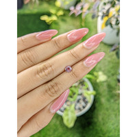 0.58 Ct. Purplish Pink Sapphire from Ceylon (Sri Lanka) Life Style