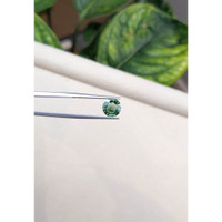 1.77 Ct. Bluish Green Sapphire from Madagascar Life Style