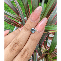 0.93 Ct. Bluish Green Sapphire from Madagascar Life Style