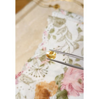 2.02 Ct. Orangish Yellow Sapphire from Madagascar Life Style