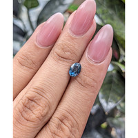 1.32 Ct. Greenish Blue Sapphire from Madagascar Life Style