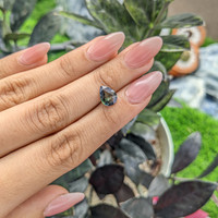 1.95 Ct. Bluish Green Sapphire from Madagascar Life Style