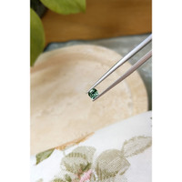 0.48 Ct. Bluish Green Sapphire from Madagascar Life Style