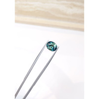 5.03 Ct. Bluish Green Sapphire from Madagascar Life Style