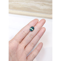 5.03 Ct. Bluish Green Sapphire from Madagascar Life Style