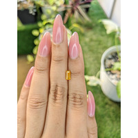 0.89 Ct. Yellowish Orange Sapphire from Ceylon (Sri Lanka) Life Style