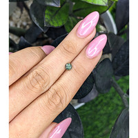 0.61 Ct. Bluish Green Sapphire from Madagascar Life Style