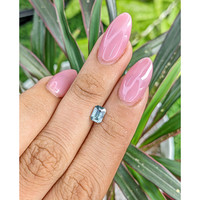 0.82 Ct. Bluish Green Sapphire from Madagascar Life Style