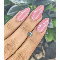 0.61 Ct. Bluish Green Sapphire from Madagascar Life Style