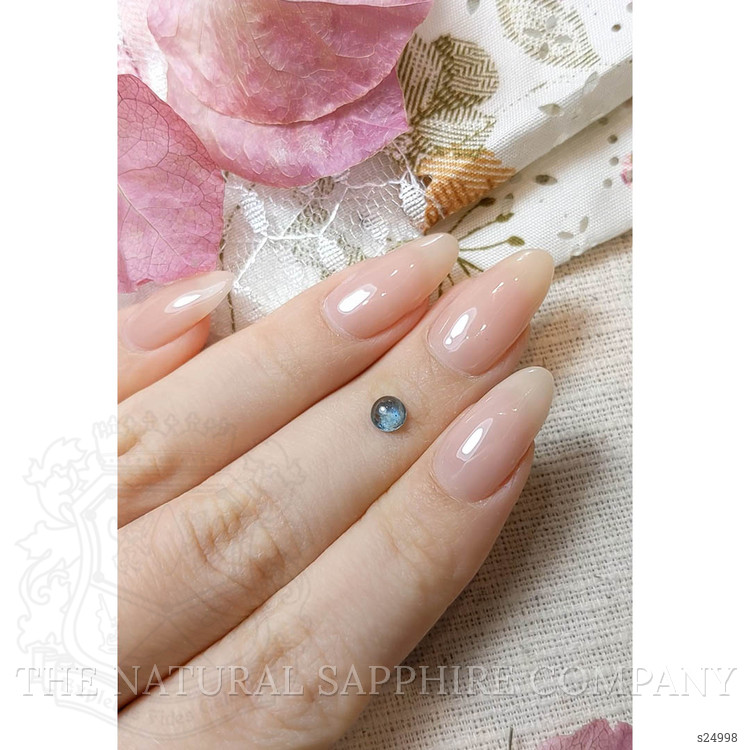 0.59 Ct. Bluish Green Cabochon Sapphire from Montana