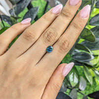 1.48 Ct. Greenish Blue Sapphire from Madagascar Life Style