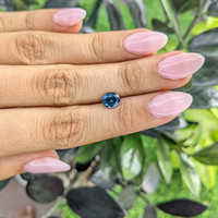 1.48 Ct. Greenish Blue Sapphire from Madagascar Life Style
