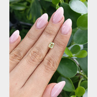 1.01 Ct. Yellowish Green Sapphire from Madagascar Life Style