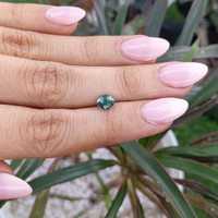 1.10 Ct. Bluish Green Sapphire from Madagascar Life Style