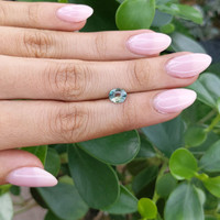 1.06 Ct. Bluish Green Sapphire from Madagascar Life Style