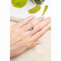 3.35 Ct. Yellowish Green Sapphire from Ceylon (Sri Lanka) Life Style