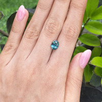 2.61 Ct. Greenish Blue Sapphire from Madagascar Life Style