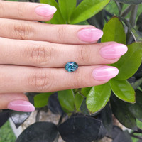 2.61 Ct. Greenish Blue Sapphire from Madagascar Life Style
