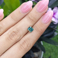 1.54 Ct. Bluish Green Sapphire from Madagascar Life Style