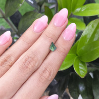 1.55 Ct. Bluish Green Sapphire from Madagascar Life Style