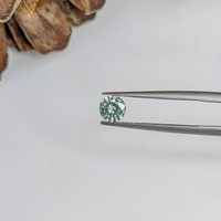 0.67 Ct. Bluish Green Sapphire from Ceylon (Sri Lanka) Life Style