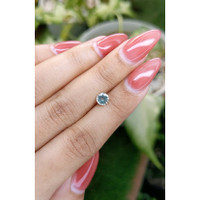 0.67 Ct. Bluish Green Sapphire from Ceylon (Sri Lanka) Life Style