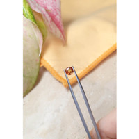 1.50 Ct. Reddish Orange Sapphire from Ceylon (Sri Lanka) Life Style
