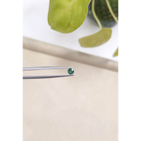 0.47 Ct. Bluish Green Sapphire from Madagascar Life Style